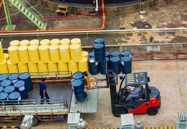 imgi_28_top-view-oil-barrels-forklift-truck-move-transportation-truck-male-worker-help-arrange_478515-4072