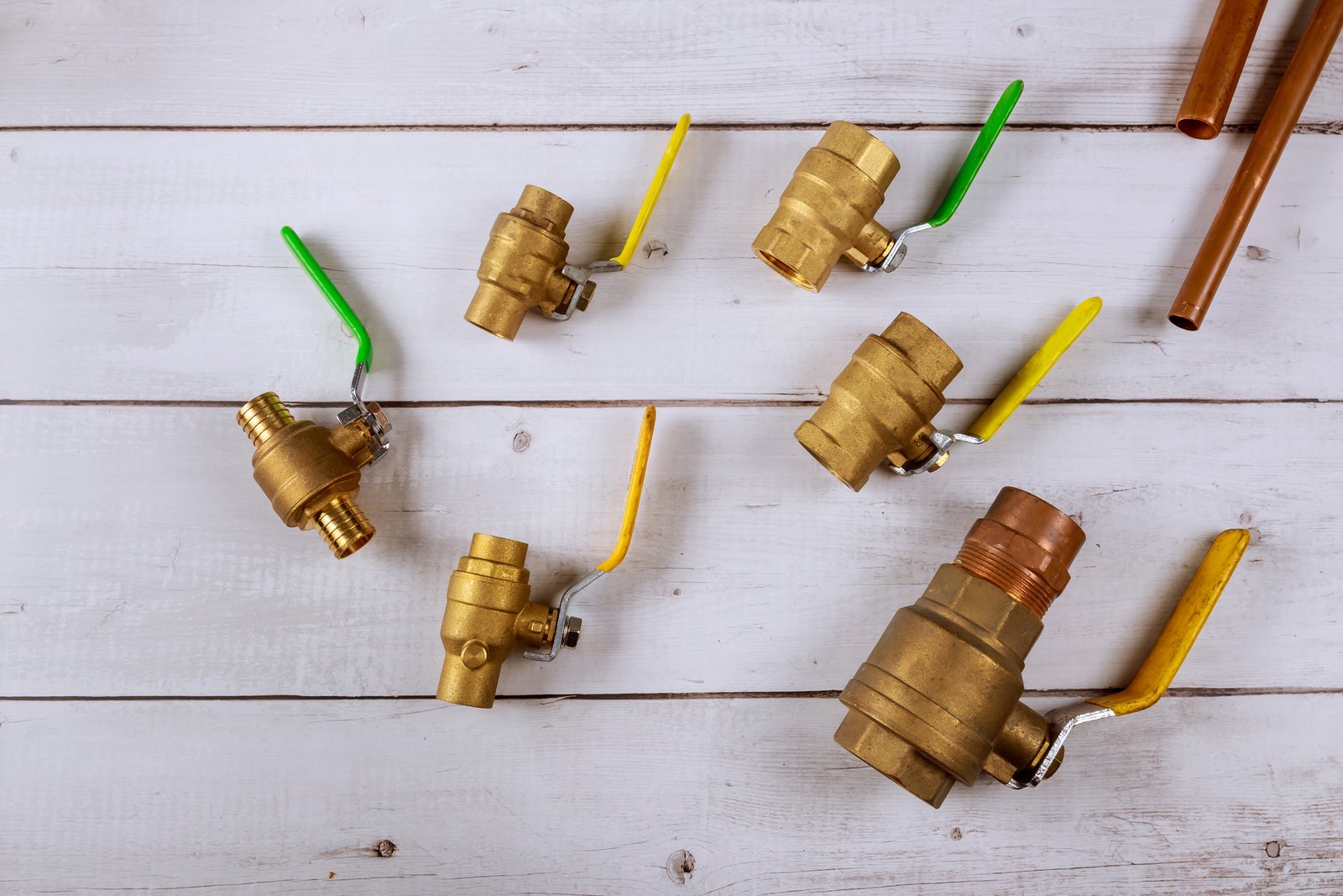 Plumbing gate ball vales, flexible water hose and fittings on a connecting pipe water of central heating system